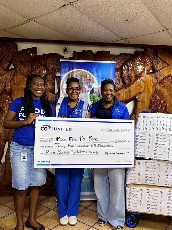CG United provided US$25,000 to the Food For The Poor programme to support roof repairs. Winsome Gibbs (right), branch manager, CG United Jamaica, made the presentation to Food For The Poor representatives, Deidre Parchment (left), finance manager, and Mar