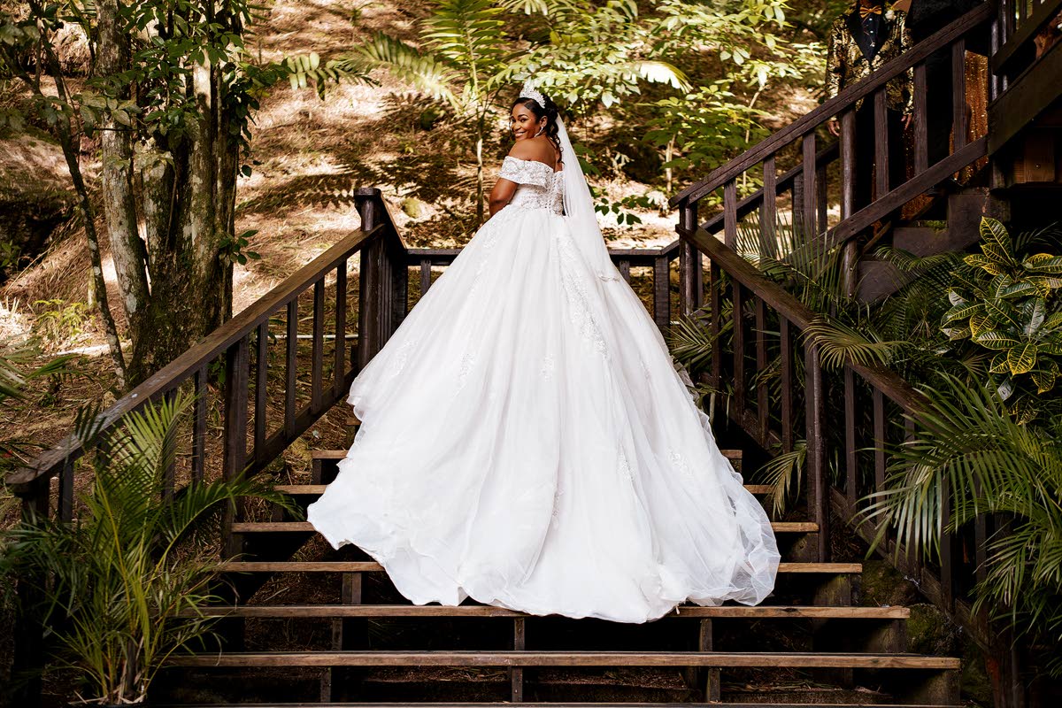 Drawn to dresses with intricate embellishments, Kimberly Magnus said yes to this stunning ball gown from Exquisite Bridal Boutique.  