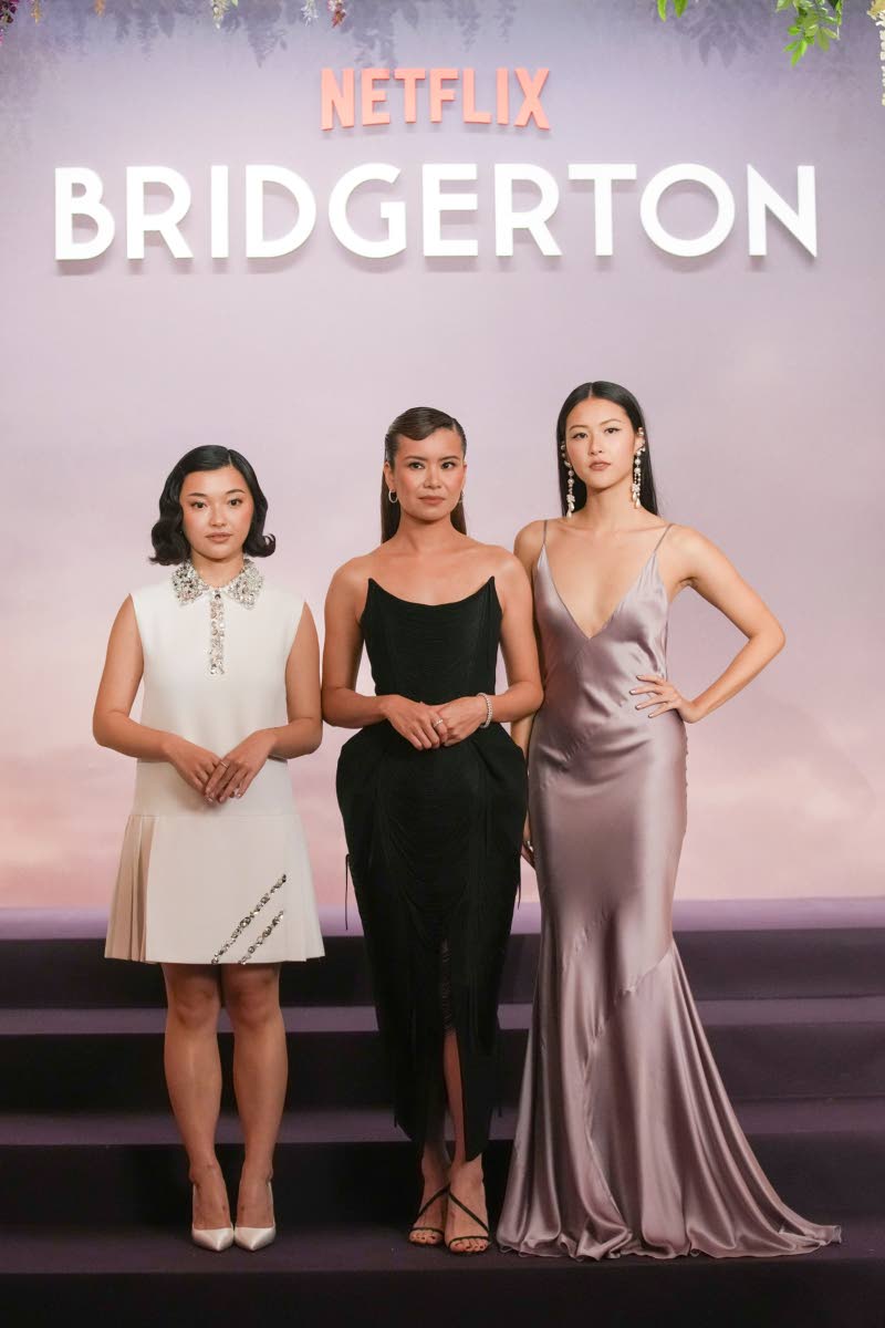 Gathering for a photo op are (from left) actresses Isabella Wei, Katie Leung and Michelle Mao. 