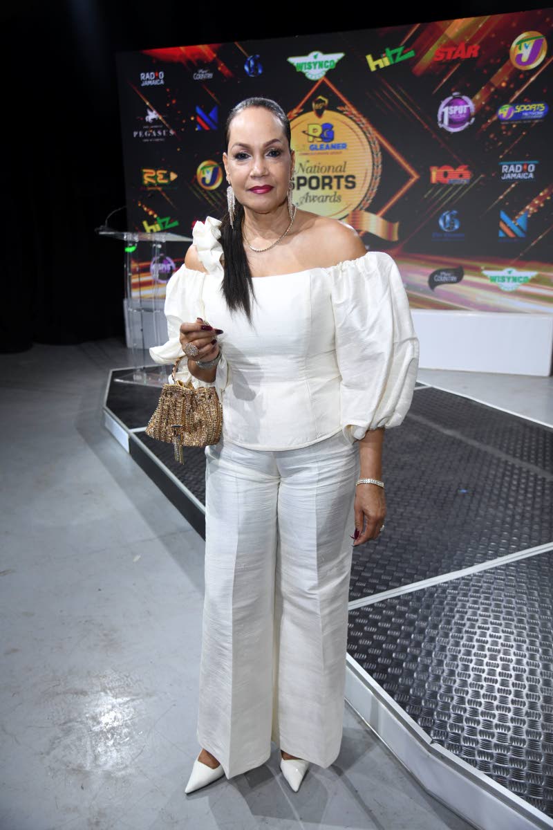 Polished to perfection in this all-white set is local fashion designer, Valerie Robinson. 