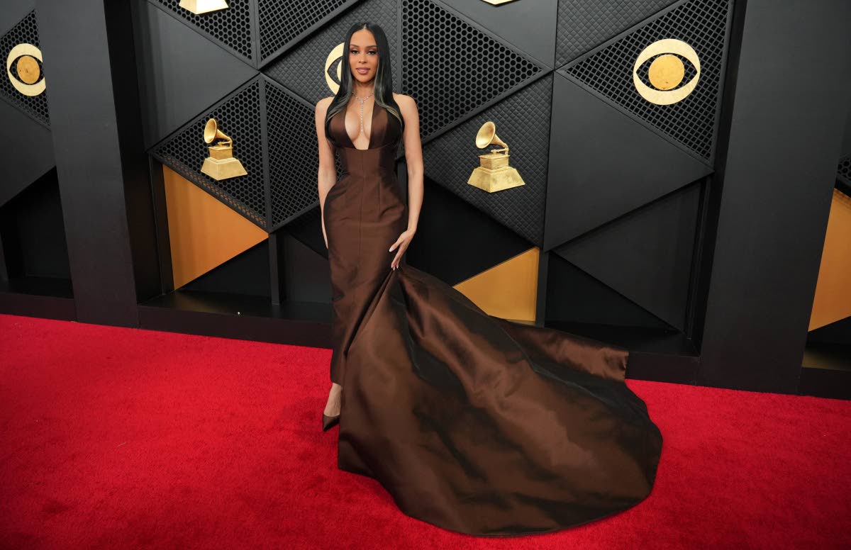 Styled by an all-woman glam squad, influencer Kristy Sarah steps out in a custom Nicole + Felicia dress.