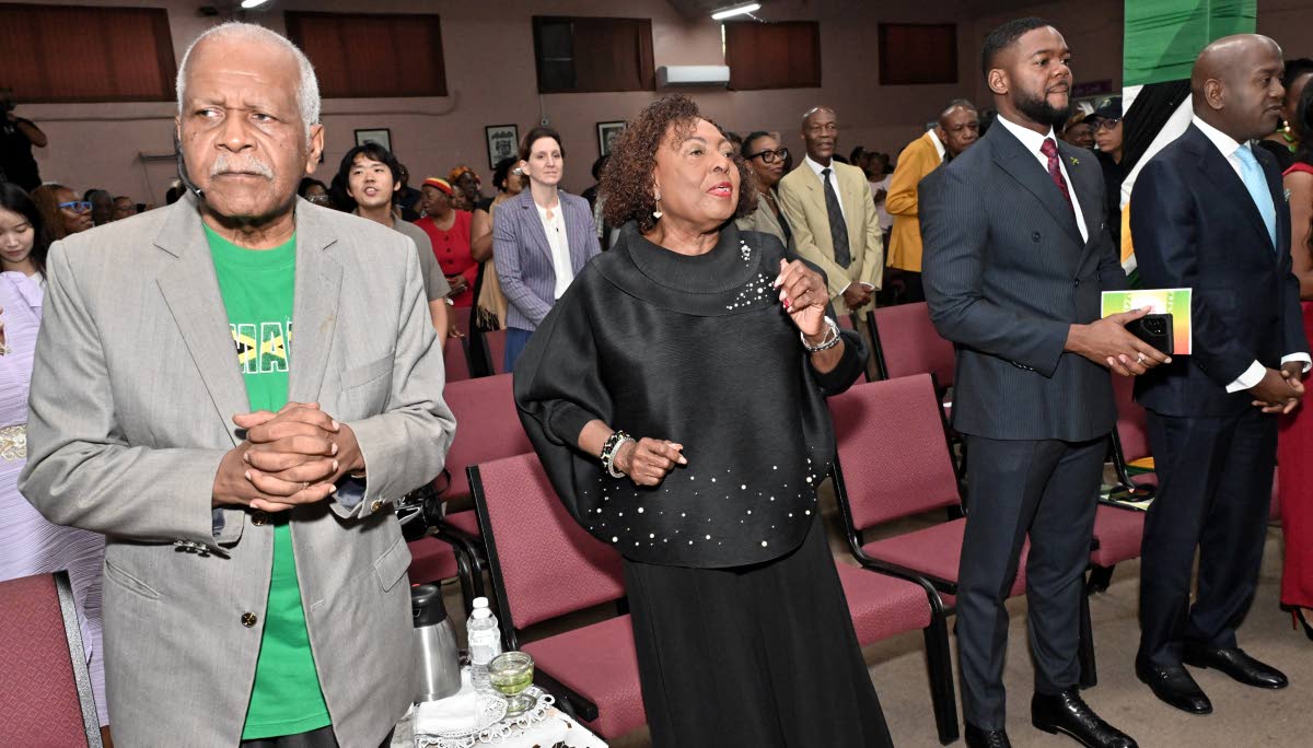 Pastor Al Miller (left) and Olivia Grange, (second left) Minister of Culture, Gender, Entertainment and Sport at praise and worship while Councillor Richard Vernon, (second right) Mayor of Montego Bay, and Duane Smith, (right) MP for St Andrew North Wester