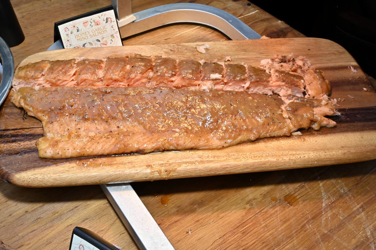 The salmon is glazed with honey, garlic, and miso, then cooked to retain moisture while developing surface caramelisation. Sweet and savoury notes are evenly integrated, with umami leading the finish.