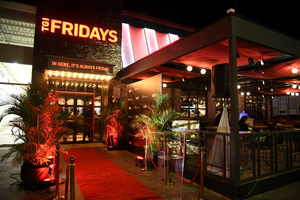 With its signature red and white stripes and illuminated signage, TGI Fridays has finally opened its second location at the Sunshine Outlet Mall on Braeton Parkway in Portmore, St Catherine.