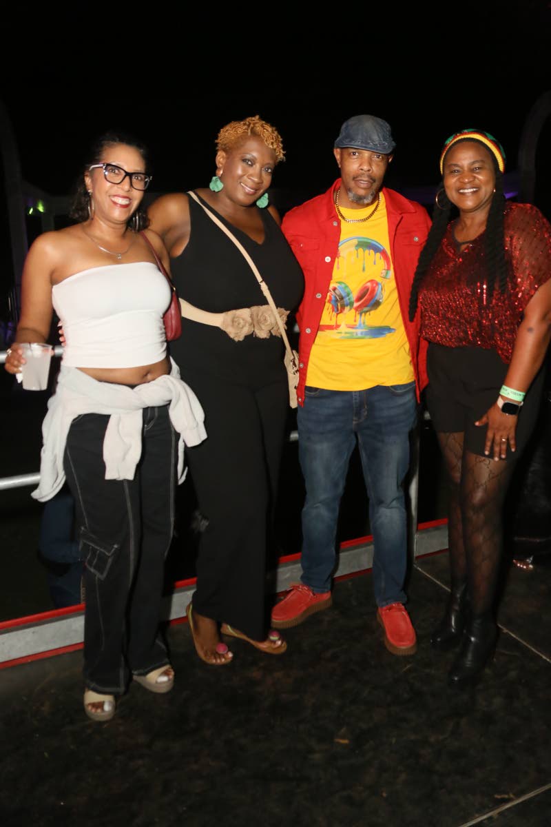 Bringing the ‘Dem Time De!’ spirit are (from left) Toni Spencer, deputy chief human resource officer; Tressa West, legal officer; St Auburn Lewis, security manager; and Caron Anderson, head of human resources.