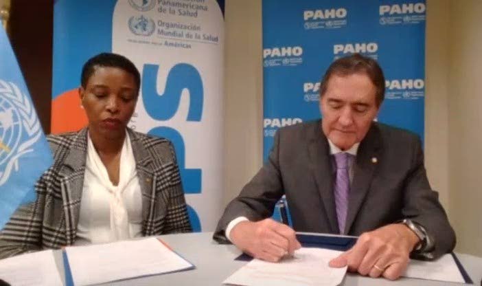 Dr Jarbas Barbosa (right), PAHO Director, signs the Framework Agreement as Dr Rhonda Sealey-Thomas, PAHO assistant director witnesses, on February 13, 2026.