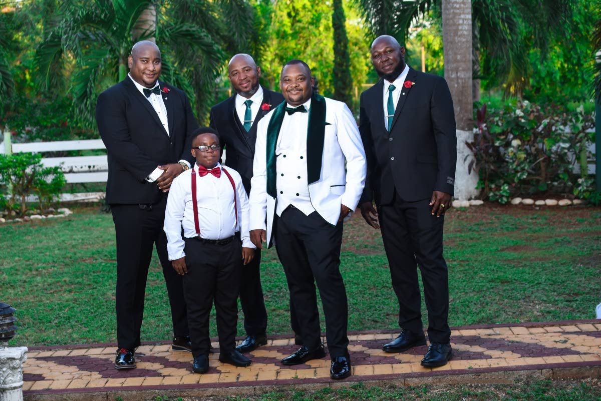 The dapper groom (second right) received support from his best lads (from left) Shawn Gordon, best man; Dushaun Powell, ring bearer; groomsmen, Gawayne Robinson and Denny Henry.