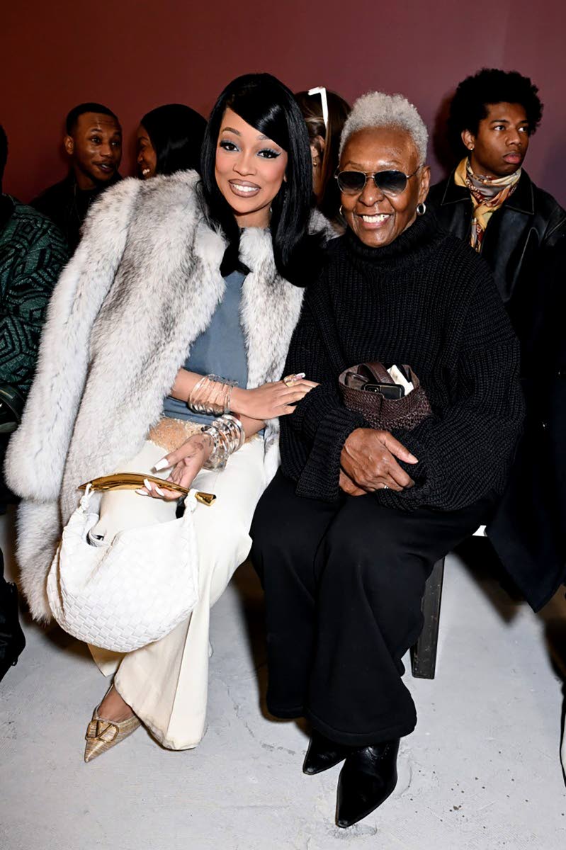 Grammy-winning chanteuse Monica (left) sat front row beside model and fashion activist Bethann Hardison.