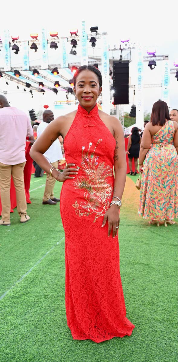 Chevaughne Miller, marketing and sales director at Caribbean Solar Life, swipes right on the perfect dress to complement her silhouette.