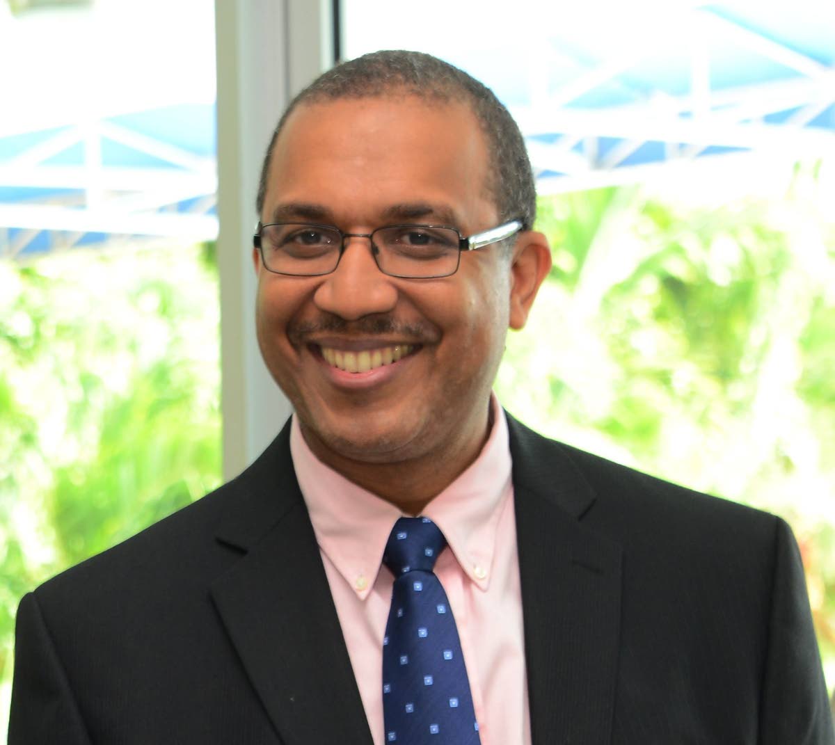 David Miller, executive director of the Fair Trading Commission.