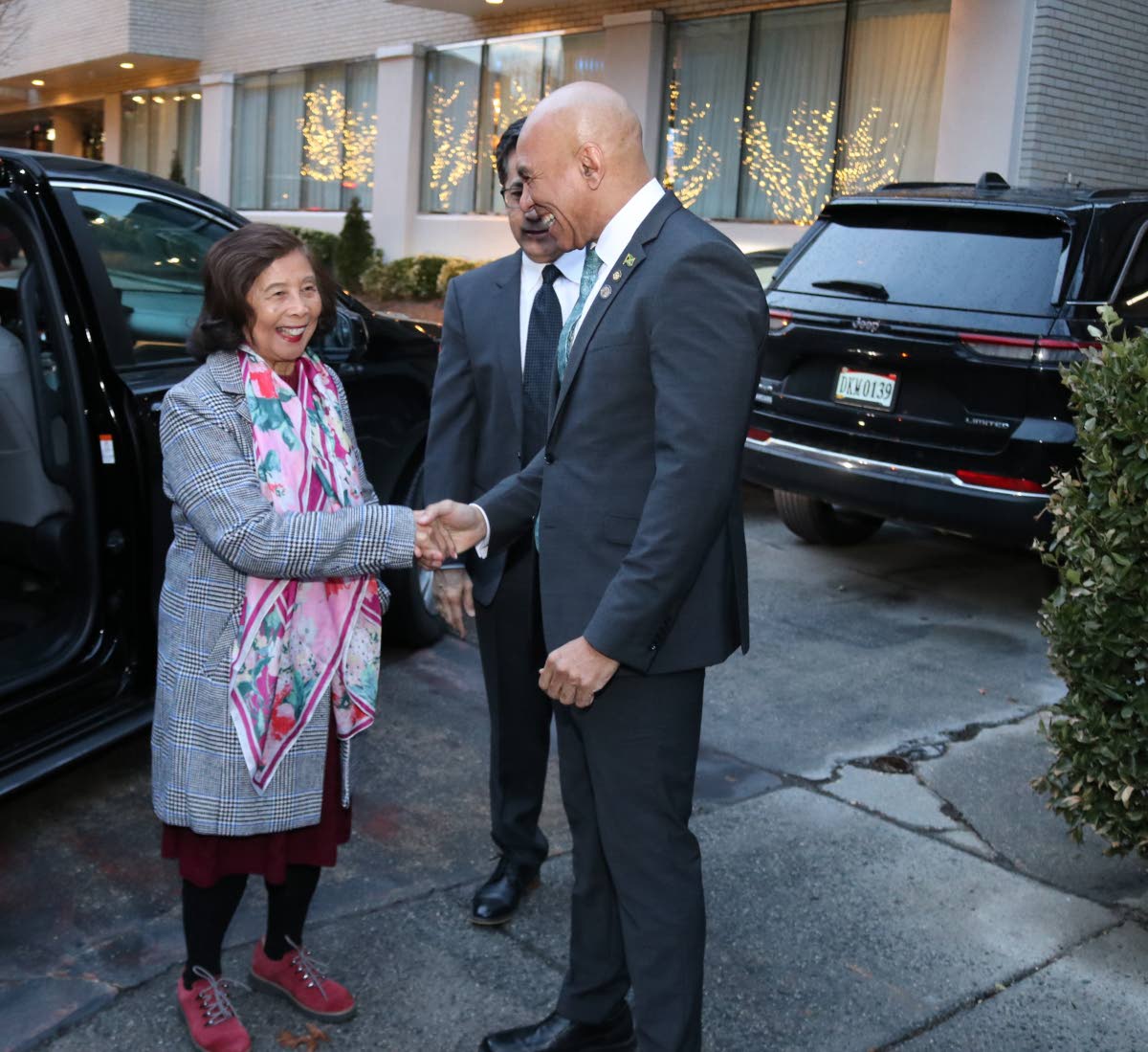  Jamaica’s Ambassador to the United States, Major General (Ret’d) Antony Anderson greets Patricia ‘Miss Pat’ Chin, co-founder of VP Records, as she arrives at the Embassy of Jamaica prior to her been honoured for her contribution to Jamaica’s mus