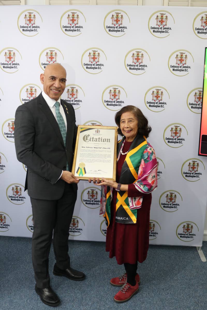 Jamaica’s Ambassador to the United States, Major General (Ret’d) Antony Anderson presents a citation Patricia ‘Miss Pat’ Chin, co-founder of VP Records, recognising her for her extraordinary contribution to Jamaica’s music and culture, at the Emb