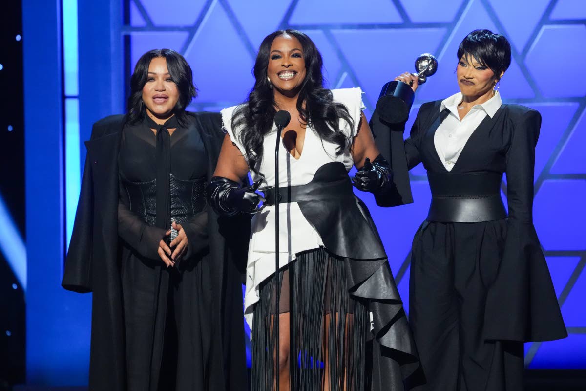 From left: Cheryl ‘Salt’ James, Deidra ‘Spinderella’ Roper and Sandra ‘Pepa’ Denton of Salt-N-Pepa accept the Hall of Fame award during the 57th NAACP Image Awards. 