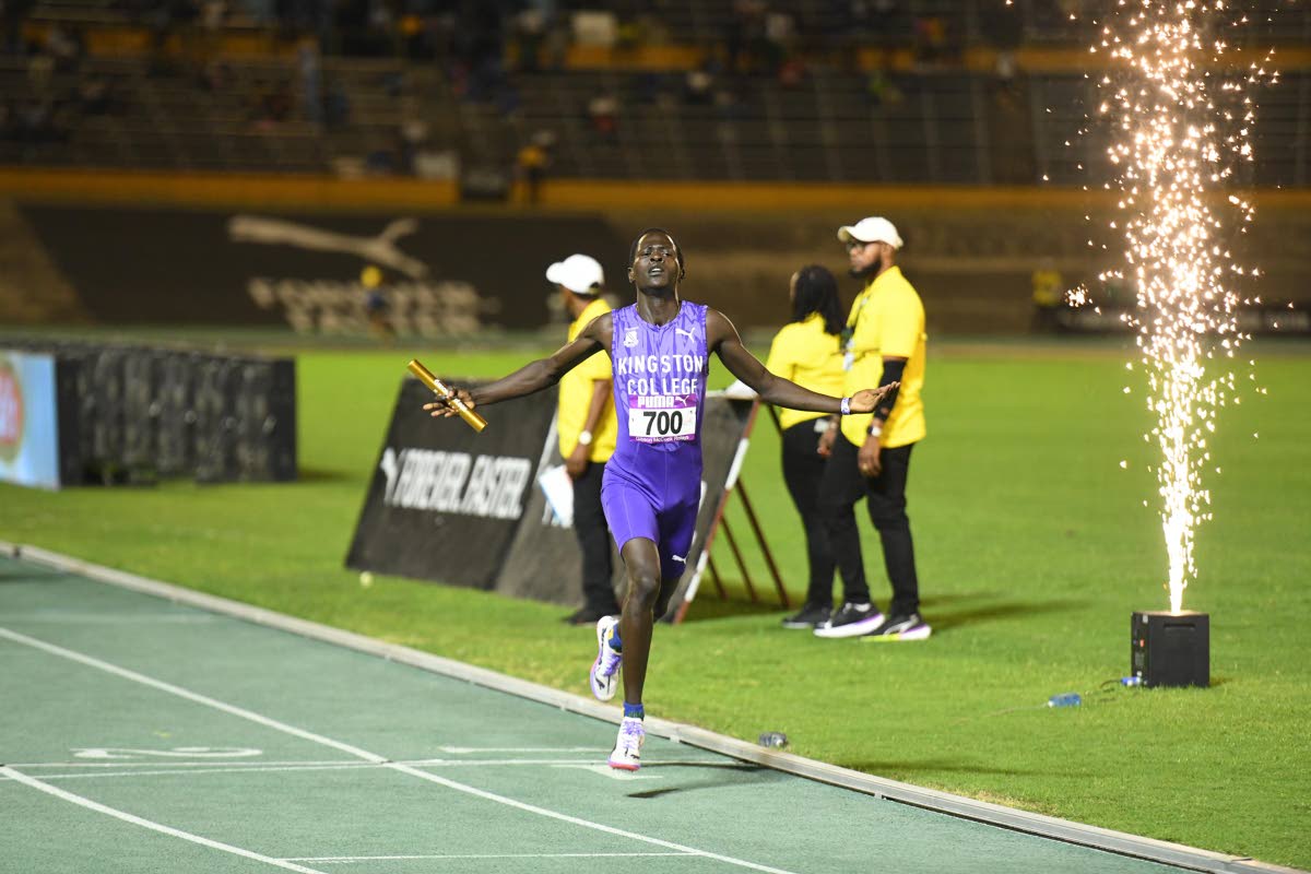 Kingston College on their way to winning the 4x800-metre final at the Gibson McCook relays inside the National Stadium on Saturday.