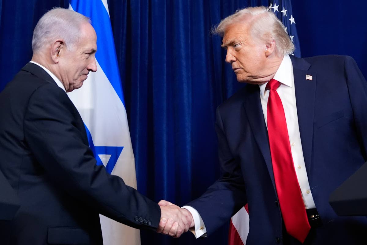 FILE – President Donald Trump shakes hands with Israel’s Prime Minister Benjamin Netanyahu during a news conference at Mar-a-Lago, Dec. 29, 2025, in Palm Beach, Florida.