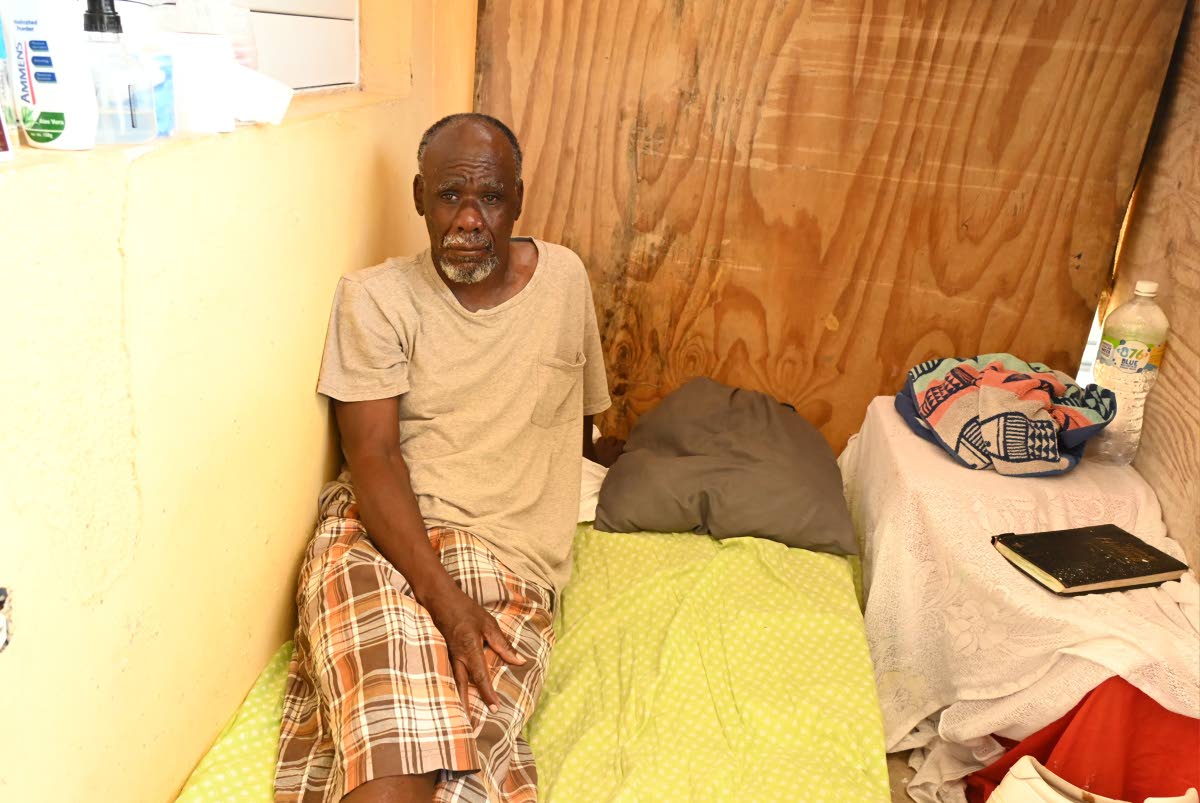 
Kemelia Campbell sits on a makeshift bed that was gifted to him by Rose Marie Glaze, certified nurse practitioner, who recently took him into her own home to care for him.