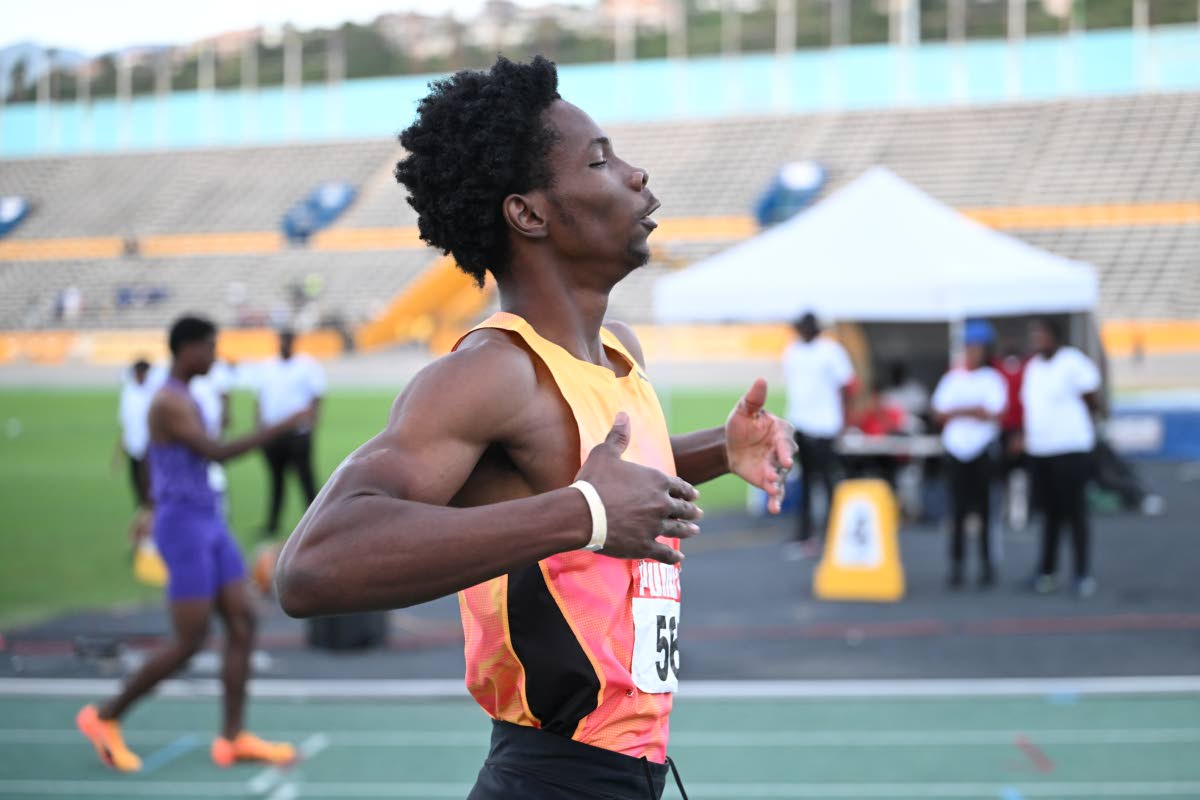 Elite Performance’s Zachary Wallace wins the under-20 boys’ 400 metres at the Carifta Trials inside the National Stadium.