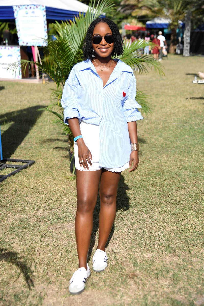 Kadia Allen nails the casual-cute look in an oversized button-down, shorts, and matching Sambas.