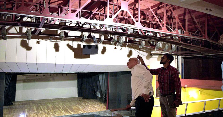 Jeffrey Hall , vice-chairman and CEO of Pan Jamaica Group (left) and Sanjay Phillips, engineering and capital projects manager at Pan Jamaica Property Company discuss the technical logistics of upgrading the Little Theatre's central air conditioning system