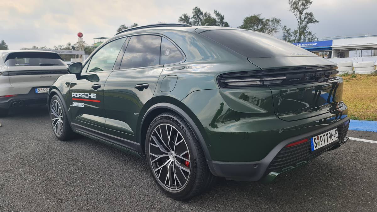 The rear view is dominated by a futuristic, three-dimensional light bar that spans the entire tailgate, perfectly complementing the integrated adaptive spoiler that adjusts dynamically to optimise downforce at higher speeds.