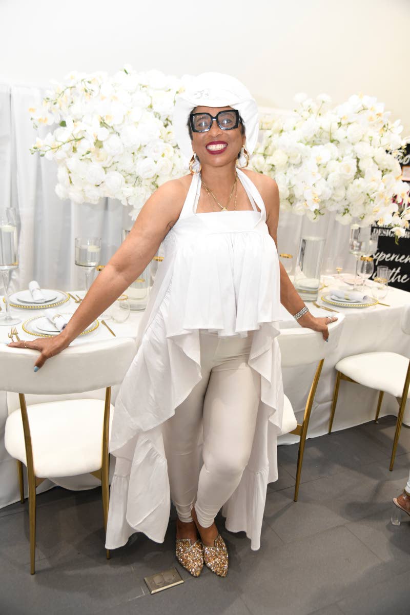 Karen Booker, founder of Dezign Diva, rocks the cutest Carolina Herrera outfit.