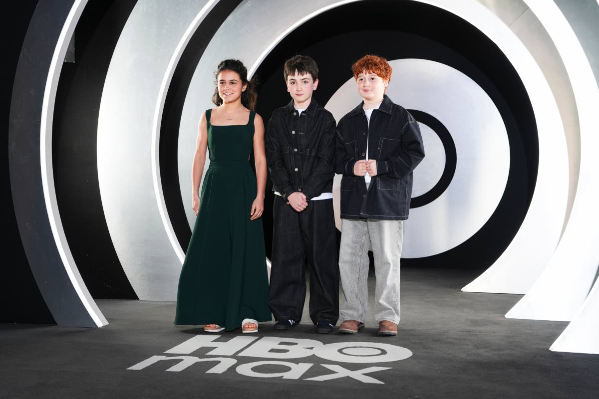 The new faces of ‘Harry Potter’ (from left): Arabella Stanton, Dominic McLaughlin, and Alastair Stout pose for photographers upon arrival at the HBO Max Launch Party in London, England, on Wednesday.