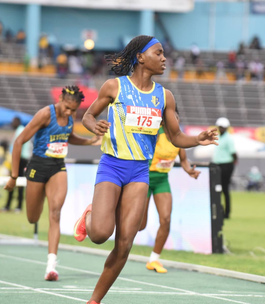 Azaria Harris of Alpha Academy celebrates after setting a new Class Three 80m hurdles record of 10.80 seconds at the ISSA GraceKennedy Boys and Girls Athletics Championships on March 27, 2026. (Ian Allen photo)
