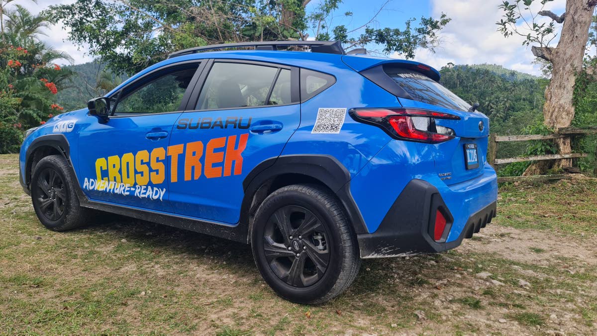 From the rear, the high-mounted spoiler and integrated diffuser elements highlight the aerodynamic refinements made to the third-generation body while maintaining a stout, planted stance.