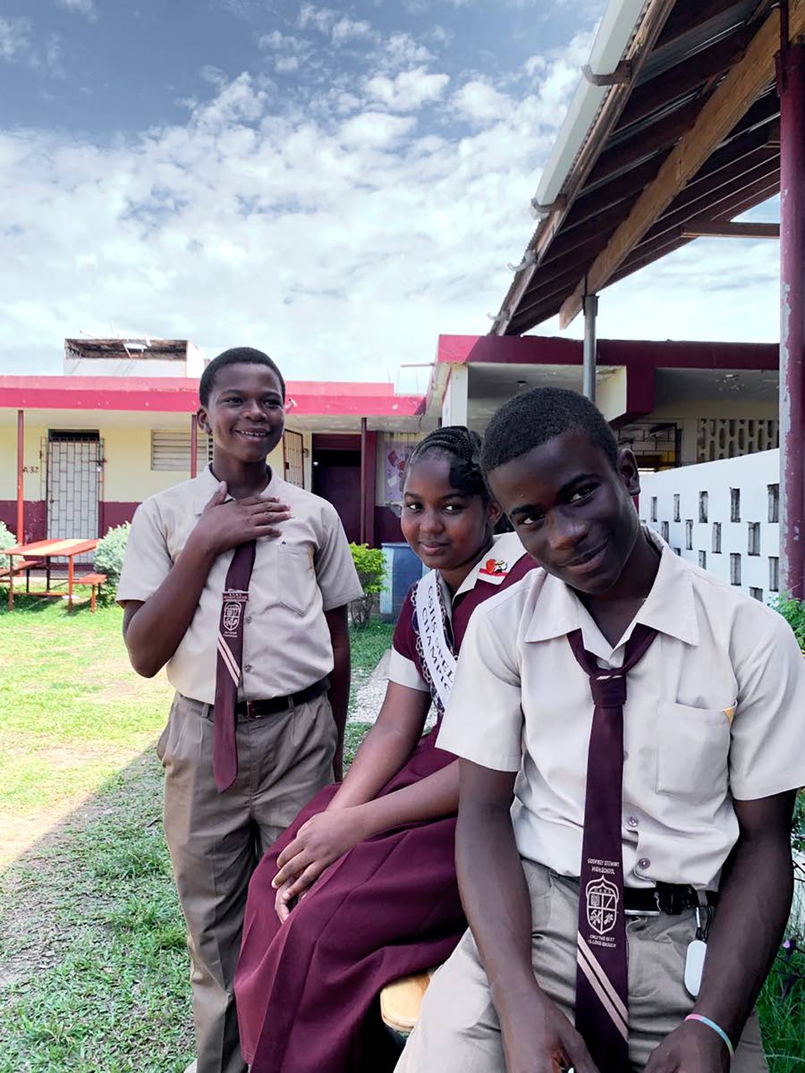 Javeem Brown (left), who finished second, winner Tahirah Lyn and Kadrae Cunningham, who finished third, after the competition.