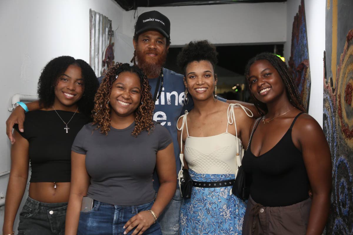 CEO of The Compound, Tom ‘Panic’ Jones is flanked by fashion designer, Ackeilia Caine (second right) and sisters and co-owners of Ahmeraki Cafe (from left) Amanda, Alyssa and Amelia Hutton, at the Rhythm Sundays showcase on Sunday.
