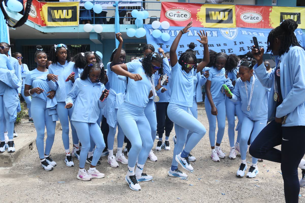 Members of Edwin Allen High’s female track team dance up a storm as they celebrate their victory in the ISSA/GraceKennedy Girls’ Athletics Championships in Frankfield, Clarendon, on Monday.
