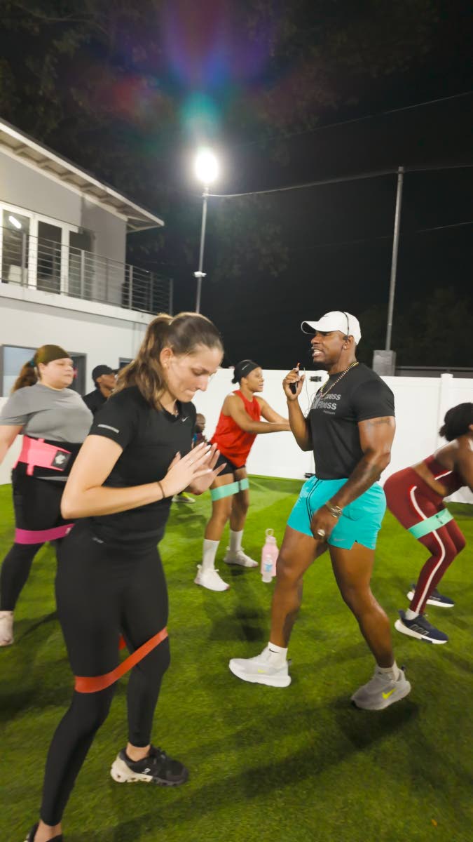 Fitness trainer Andre ‘Supreme’ Brown guides patrons attending a recent Xodus Carnival co-sponsored ‘Soca Buns’ class at the Express Fitness Platinum Gym at Constant Spring Golf Club.