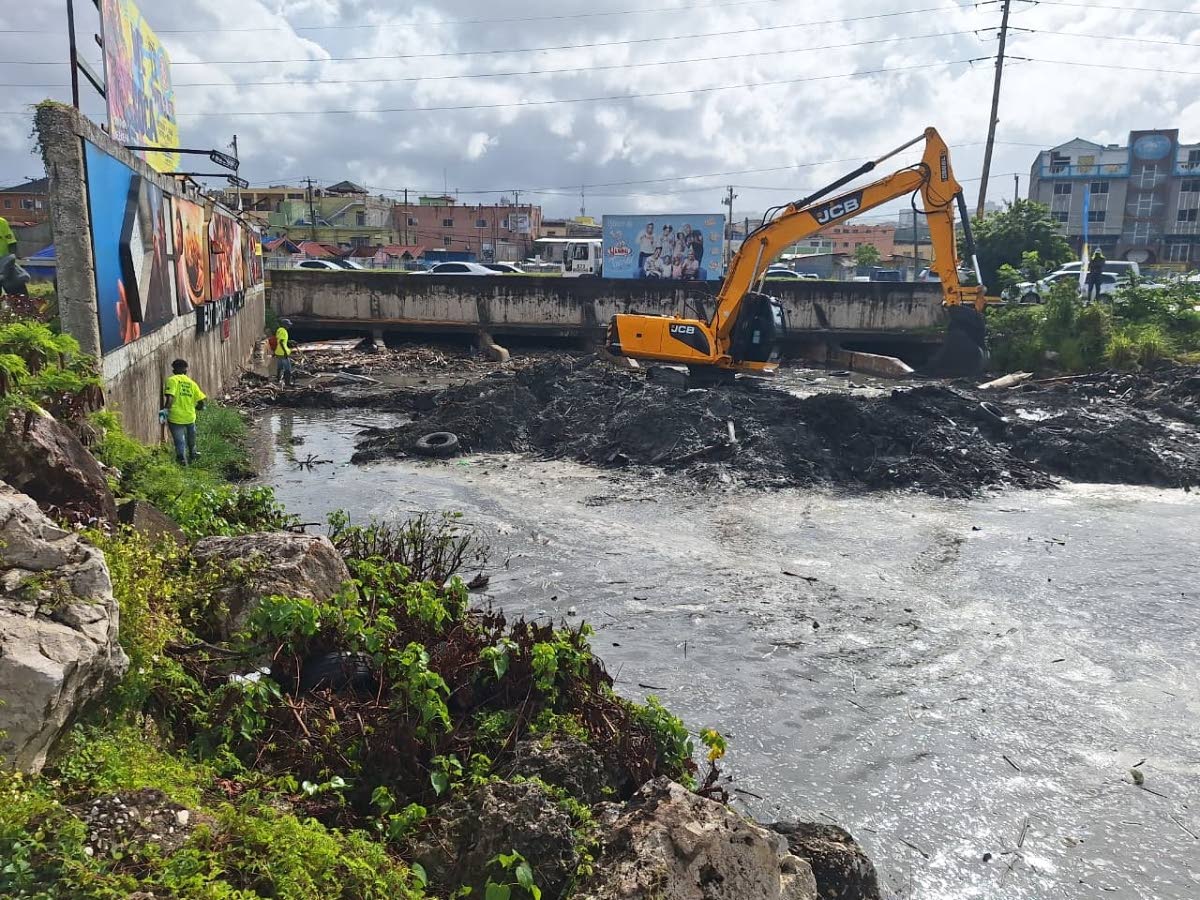 NSWMA crew clearing the mouth of the South Gully in Montego Bay.