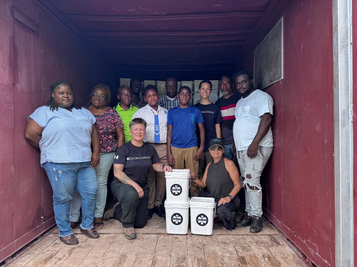 Recipients, volunteers, and partners during the distribution of 1,175 emergency food kits in Westmoreland, part of an initiative led by Global Medic in response to the need brought on by Hurricane Melissa.