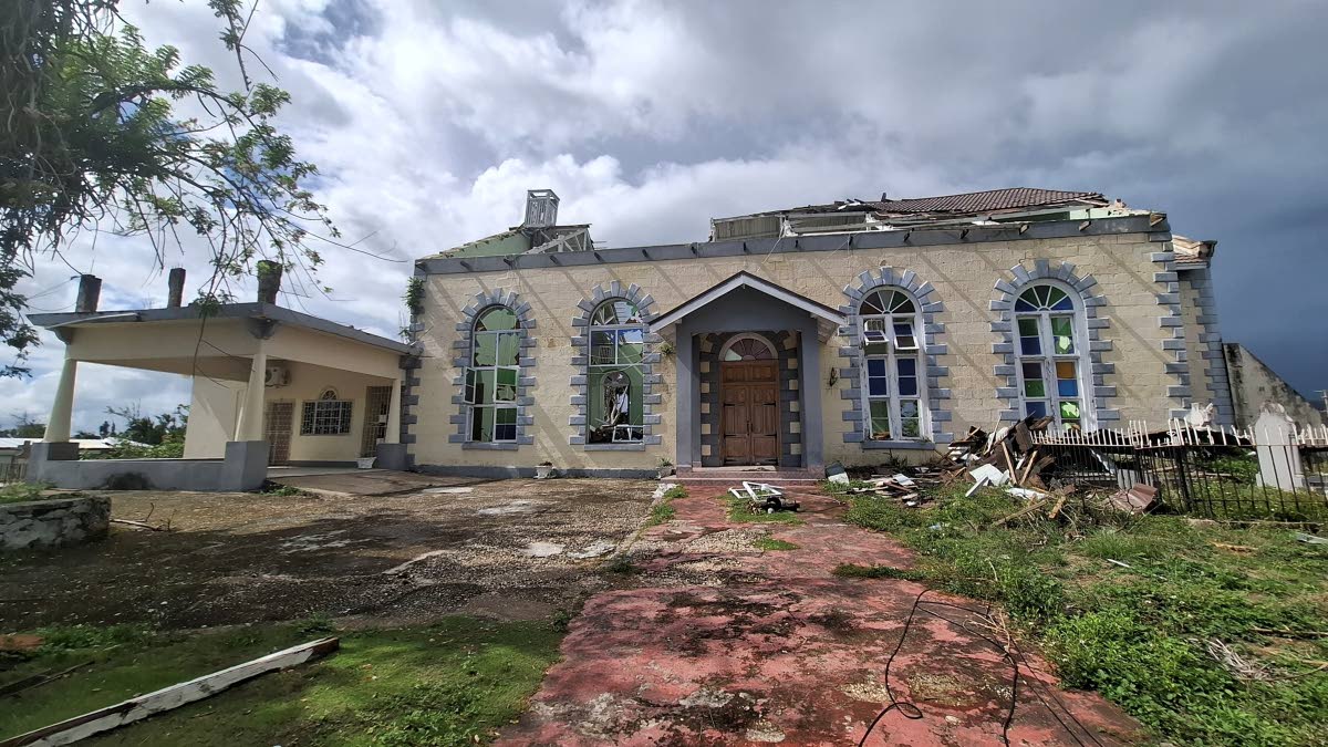 The damaged St Peter's Anglican Church in Petersfield, Westmoreland, still shows the impact of Hurricane Melissa with its roof torn off and several windows missing.