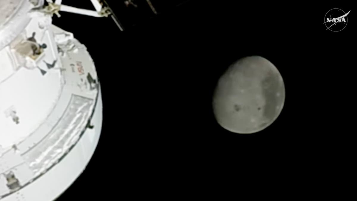 In this image from video provided by NASA, the Moon is seen from a camera outside the Orion Spacecraft after the Artemis II astronauts surpassed the farthest distance ever traveled by humans from Earth on April 6, 2026. (NASA via AP)