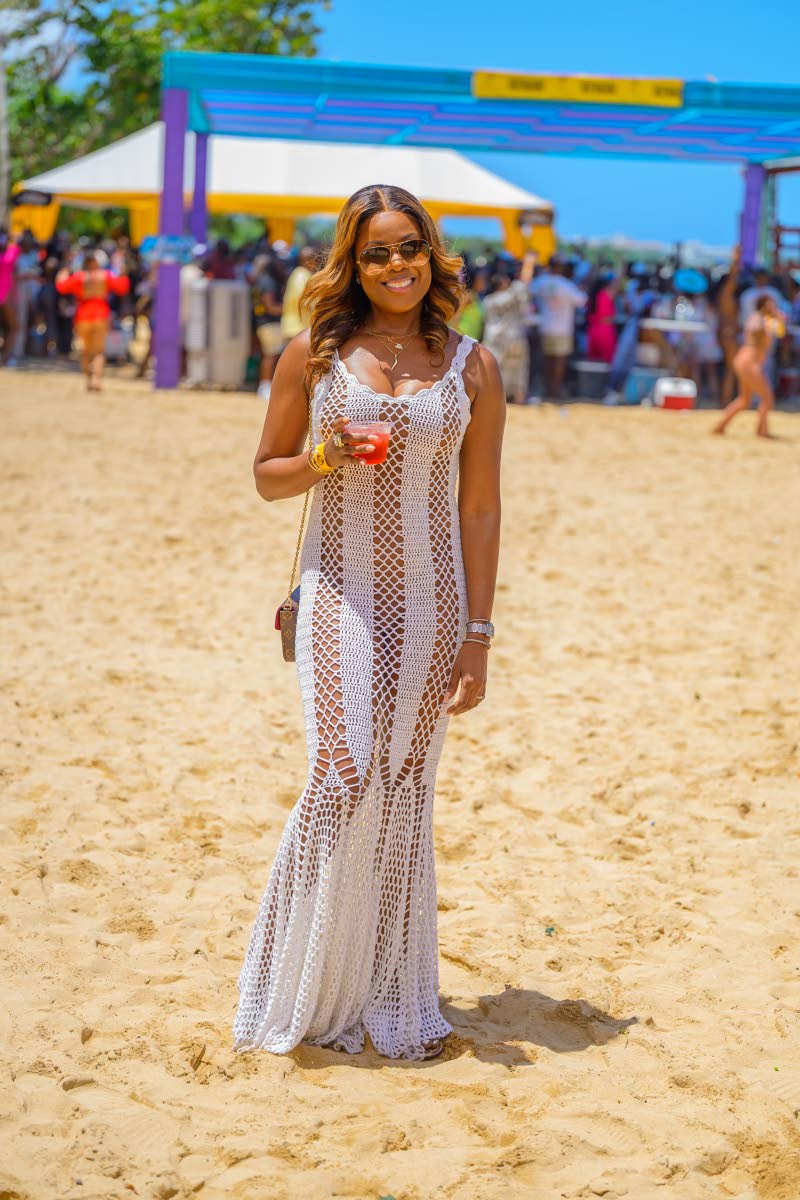 With a Johnnie Walker cocktail in hand, WellCare Medical Services Managing Director Dr Debi-Ann Newell is all smiles.