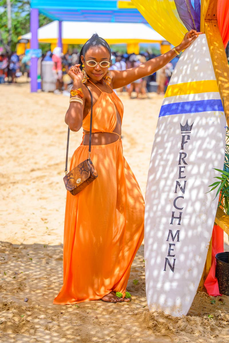 Orange is definitely aesthetician Kalema Taylor’s colour.
