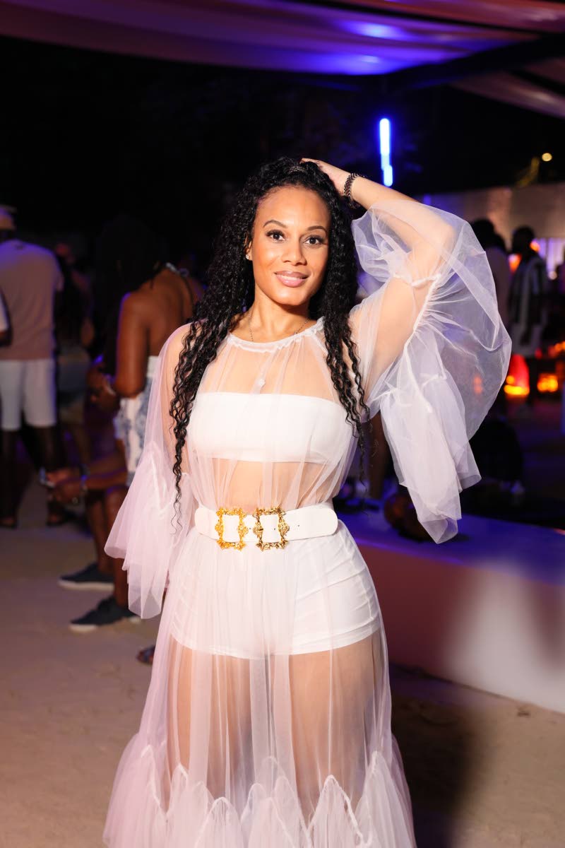 The spotlight’s on psychiatric nurse practitioner, Shawna Ximines, elevating her Porti Beach look with a mesh cover-up.