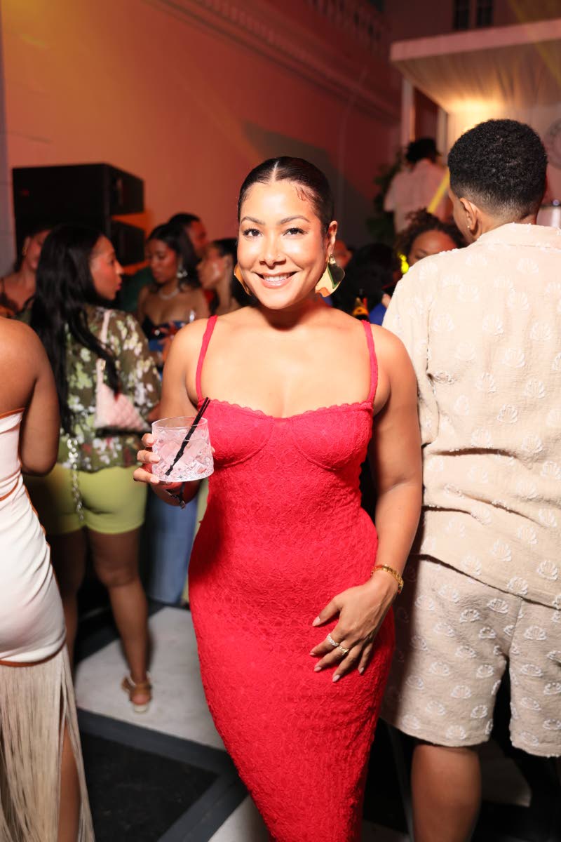 Striking in red is wellness entrepreneur Feli Wong.