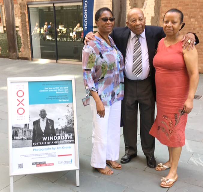 RAF veteran Gilbert Clarke is accompanied by nieces Cassandra Harvey (left) and Opal Johnson-Christie at an exhibition featuring Windrush pioneers in London.