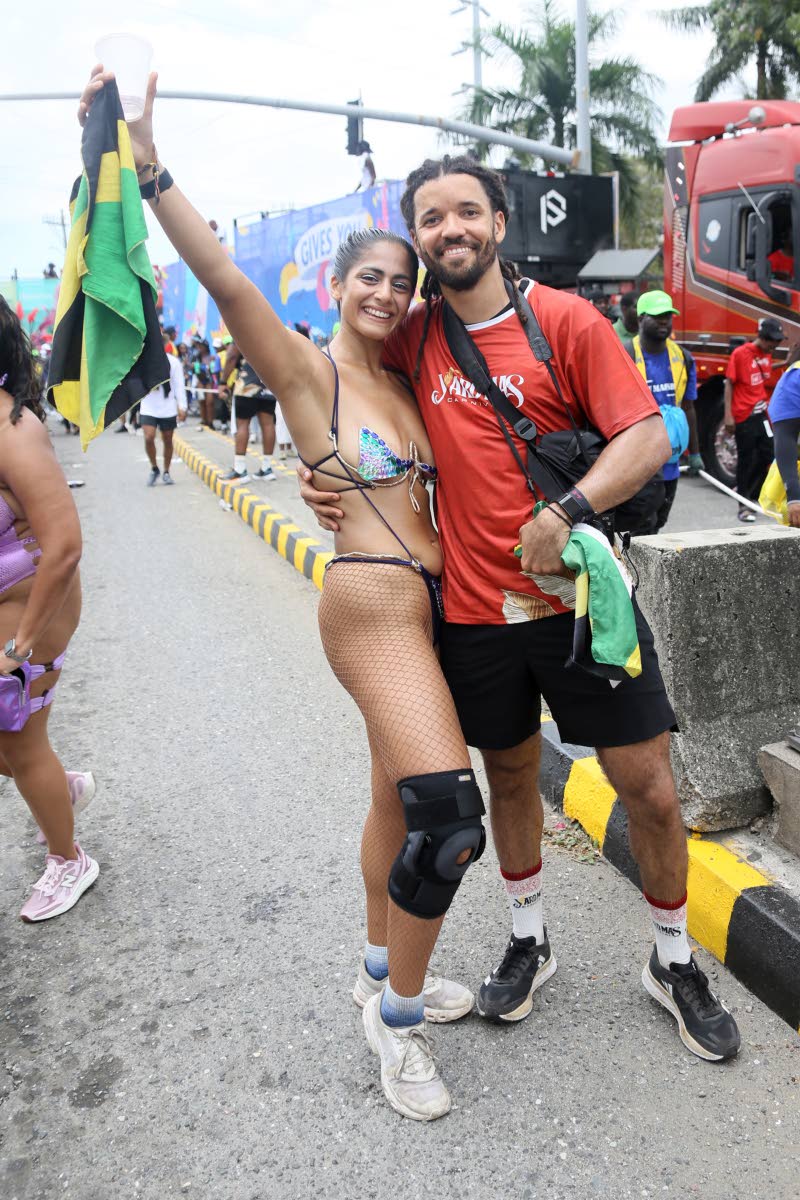 Maria Gonzales poses with her photographer partner Rico Suaves.