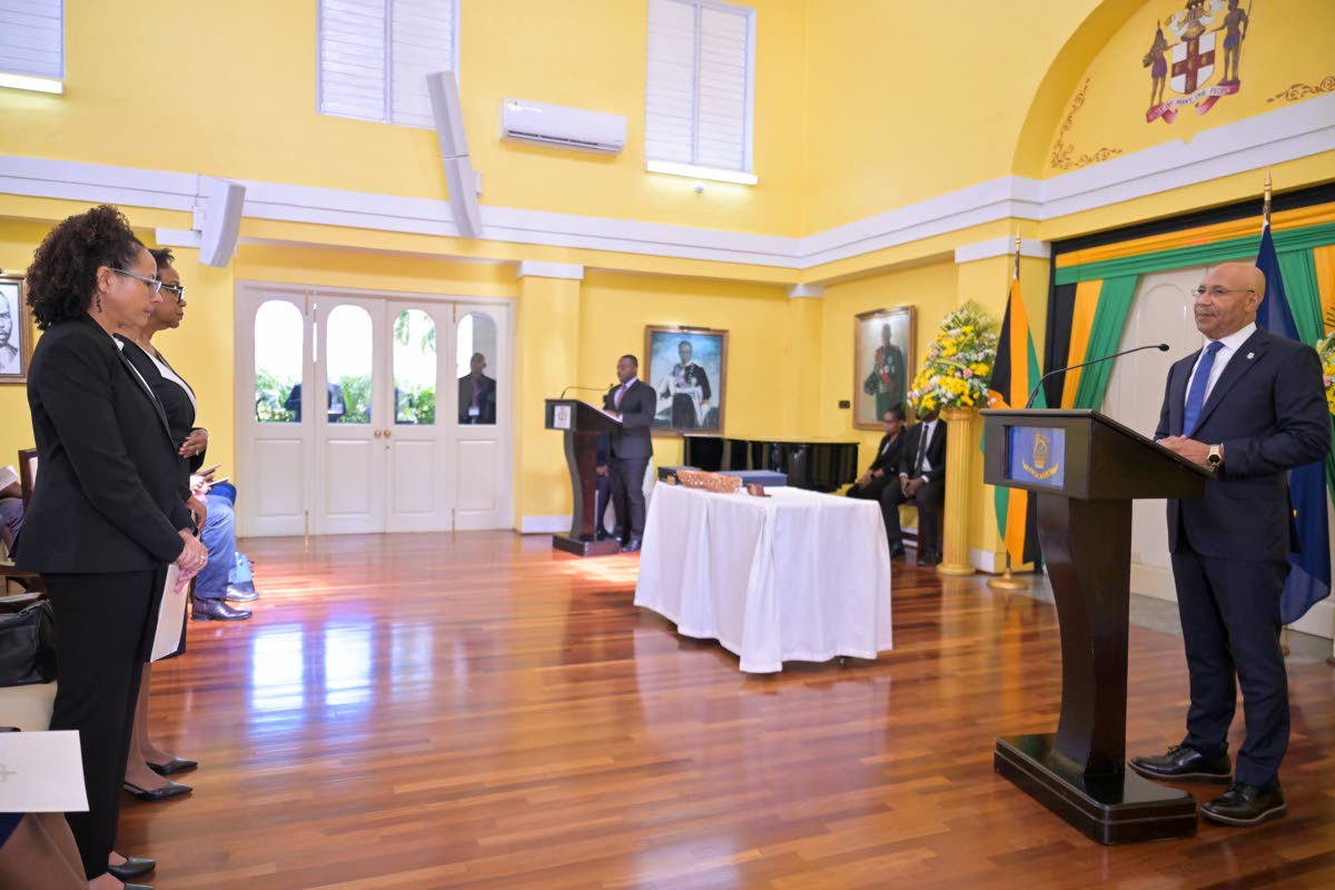Governor General Sir Patrick Allen (right) administers the oath of allegiance and the judicial oath to Acting Judges of Appeal Justice Carolyn Tie-Powell (left) and Justice Lorna Shelly-Williams, during a swearing-in ceremony at King’s House in St Andrew