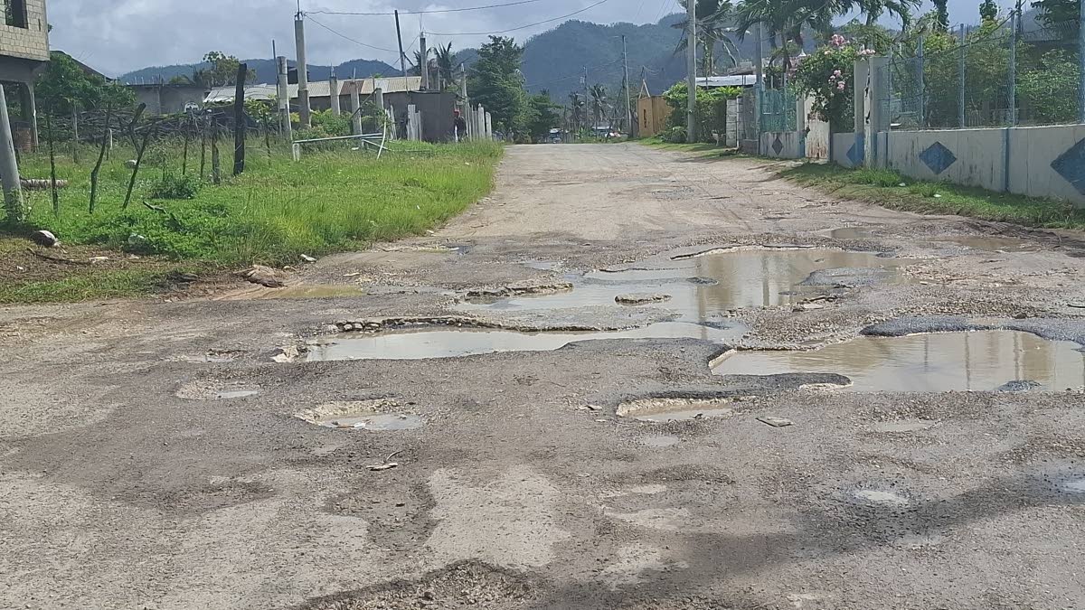 Severely damaged sections of the Hertford main road, riddled with potholes and uneven surfaces, highlight the conditions that have sparked protests by taxi operators and residents.