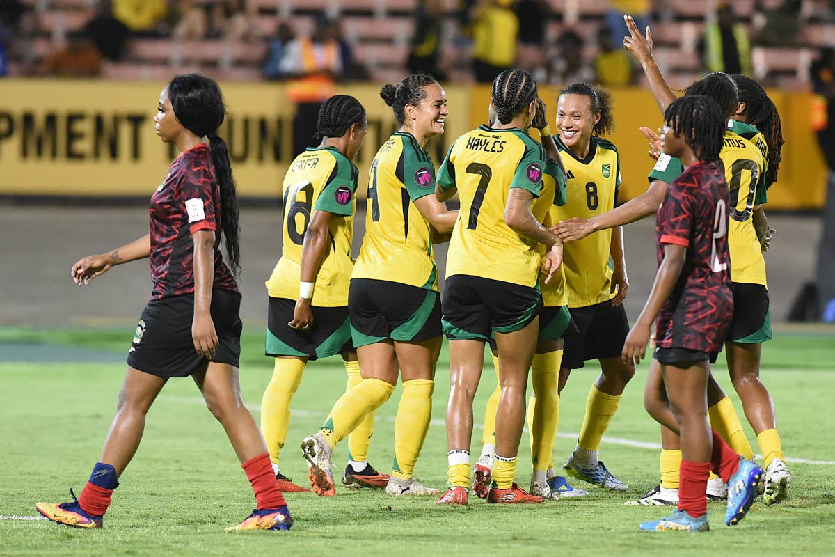 Jamaica’s Reggae Girlz celebrate after scoring their fourth goal against Antigua and Barbuda at the National Stadium on Friday, April 10.  Jamaica defeated Antigua and Barbuda 4-0.
