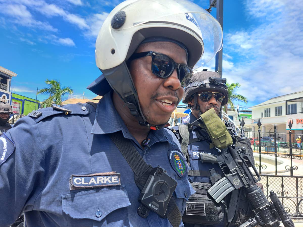 Police Corporal Ellington Clarke, of the St James Traffic Department, speaking to journalists during a press conference in Montego Bay, St James, yesterday.