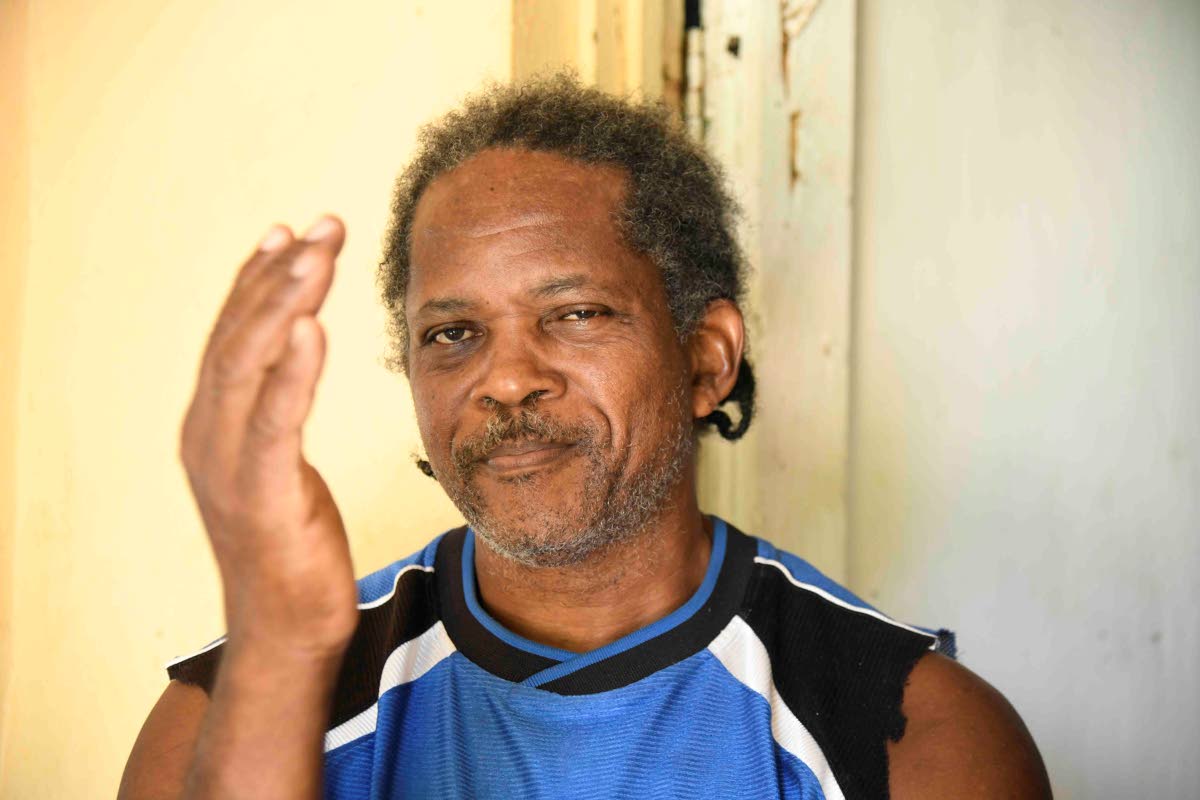 Neville Clarke said the accomplishment of owning a home has been dampened by the fact that he has, for years, been living without basic social amenities. 