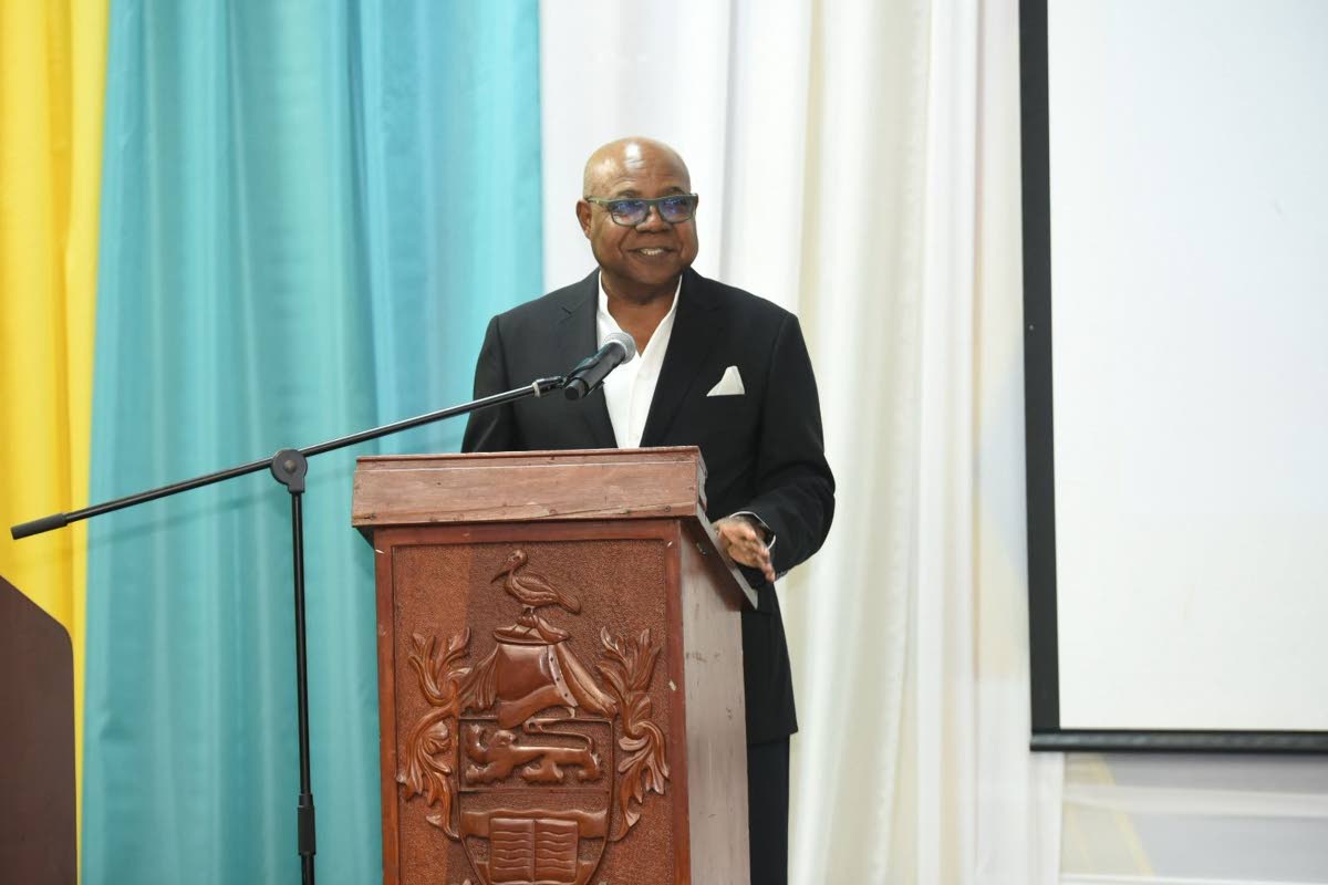 Tourism Minister Edmund Bartlett addressing students at the Jamaica Youth Tourism Summit and Artisan Experience in Montego Bay, St James last week. 