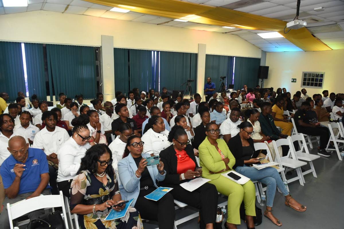 Participants at the Jamaica Youth Tourism Summit and Artisan Experience, in Montego Bay, listening to Tourism Minister Edmund Bartlett’s address.
