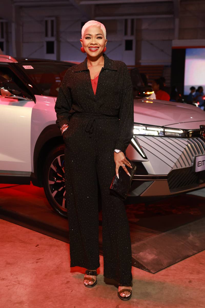 Ever on brand, media personality and the event’s host, Deborah ‘Debbie’ Bissoon, is sleek in a stylish black one-piece with a hint of Fidelity Motors red at the official launch event for the GAC brand held at the National Indoor Sports Centre on Wedn